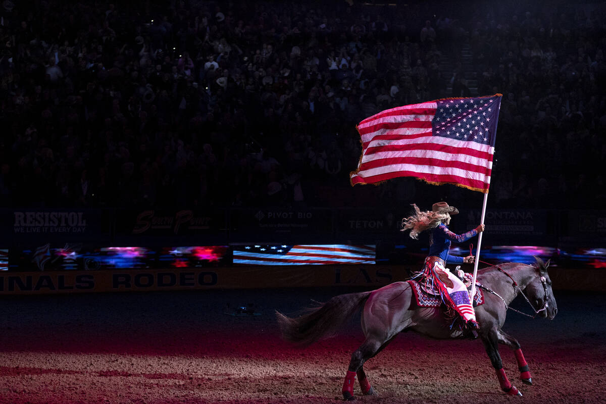 Miss Rodeo America introduces the National Anthem during the sixth go-round of the National Fin ...
