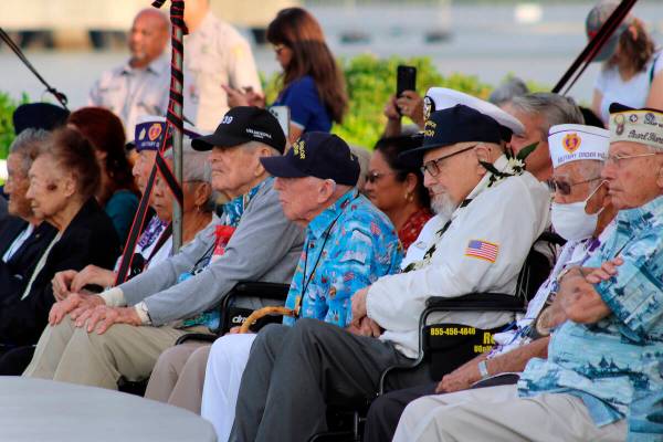 Pearl Harbor survivors and other military veterans observe a ceremony on Wednesday, Dec. 7, 202 ...