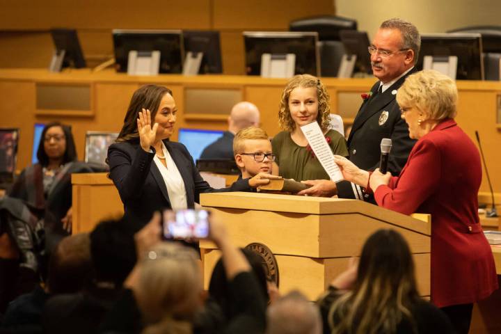 City Councilwoman Francis Allen-Palenske, left, is sworn in by Mayor Carolyn Goodman at Las Veg ...