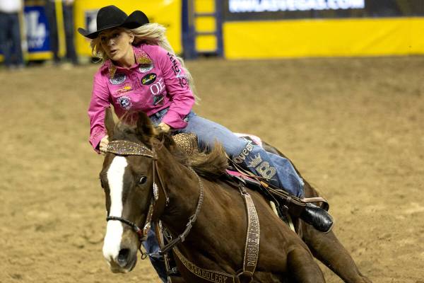 Bayleigh Choate, of Fort Worth, Tex., competes in barrel racing during the sixth go-round of th ...