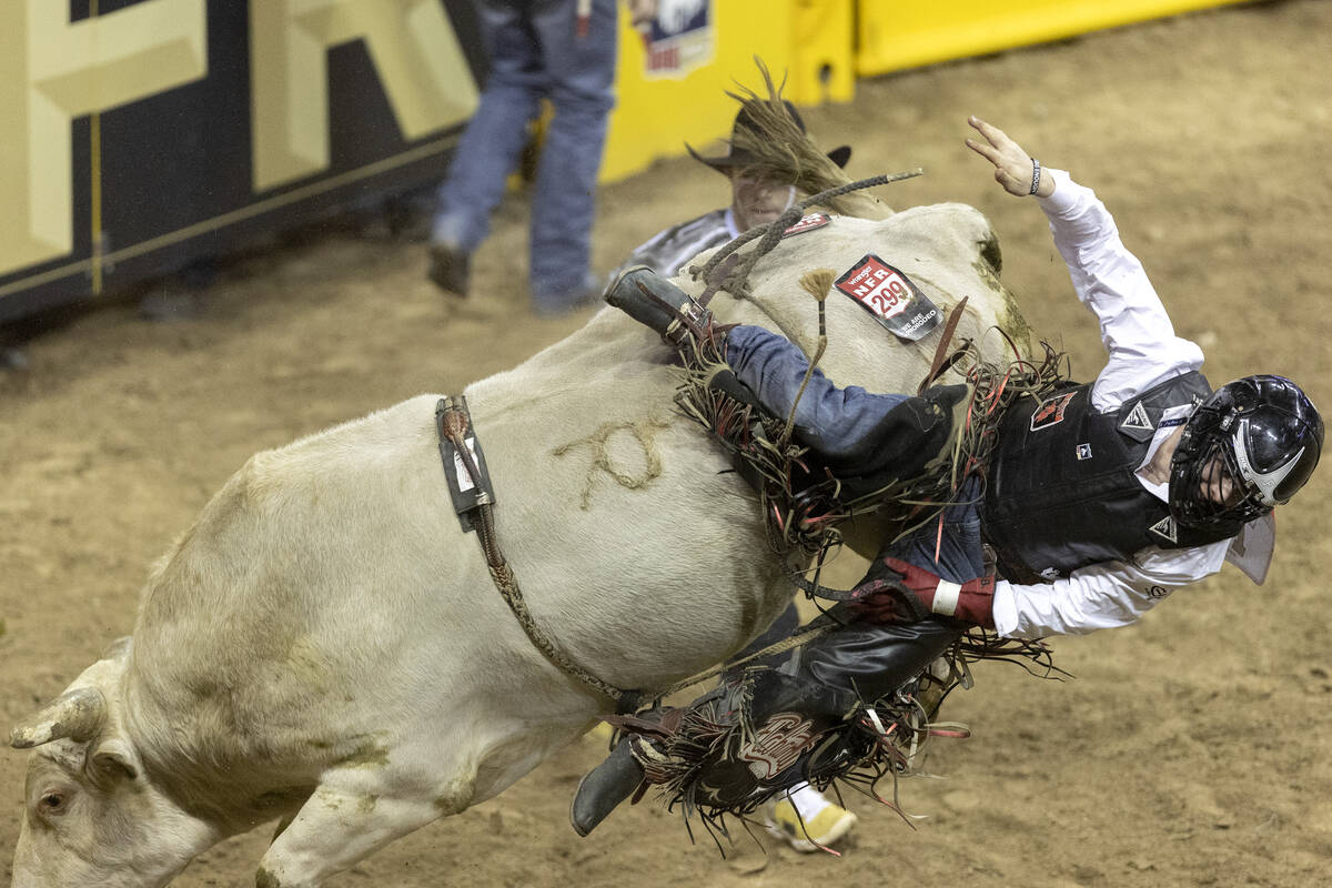 Trey Holston, of Fort Scott, Kan., is thrown from his animal while competing in bull riding dur ...