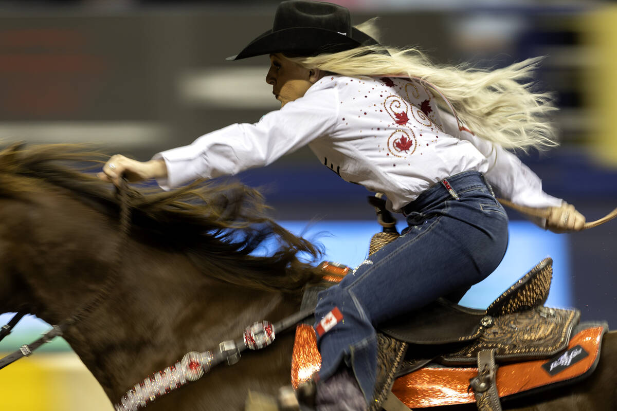 Bayleigh Choate, of Fort Worth, Tex., competes in barrel racing during the eighth go-round of t ...