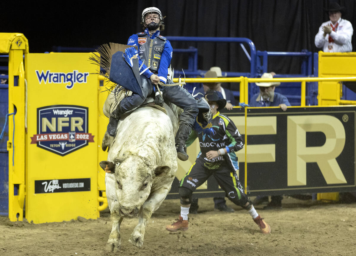 Stetson Wright, of Milford, Utah, competes in bull riding during the eighth go-round of the Nat ...