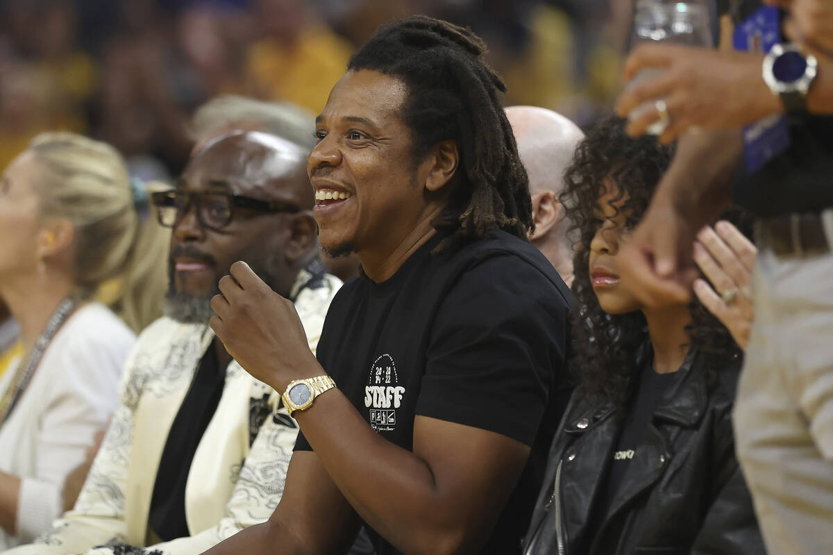 Jay-Z watches during the first half of Game 5 of basketball's NBA Finals between the Golden Sta ...