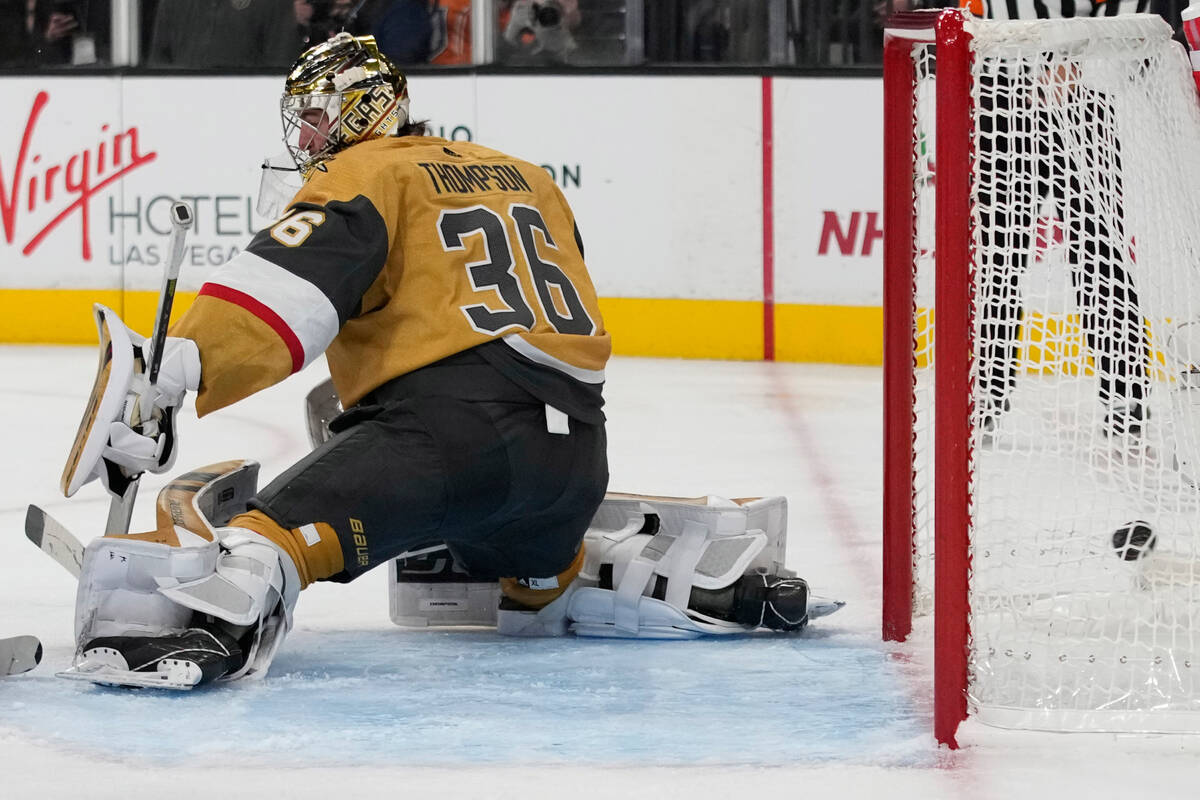 Vegas Golden Knights goaltender Logan Thompson (36) is scored on by New York Rangers center Mik ...