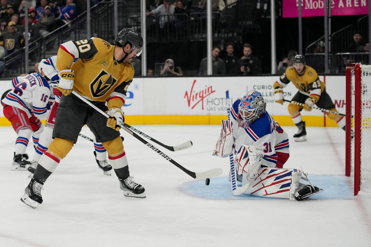 New York Rangers goaltender Igor Shesterkin (31) blocks a shot by Vegas Golden Knights center C ...