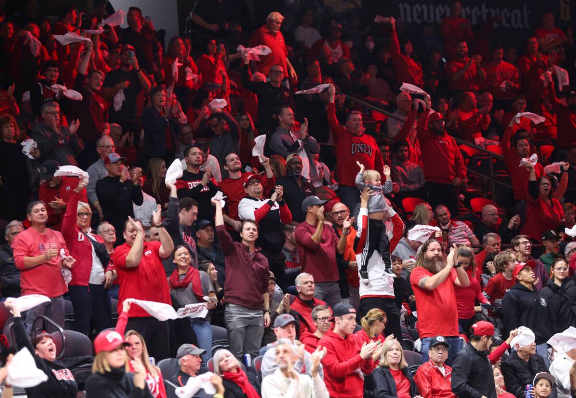 UNLV Rebels fans cheer during the second half of a basketball game against Hawaii at the Dollar ...