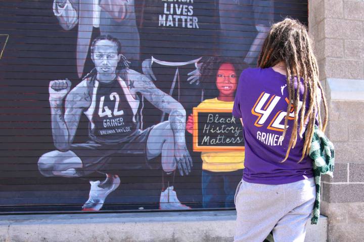 Carly Givens of Phoenix shows support for Brittney Griner, Thursday, Dec. 8, 2022, in Phoenix. ...