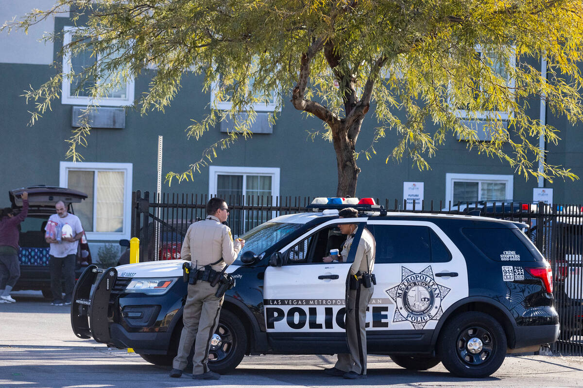 Las Vegas police is investigating after two men were killed during a battle over a semi-automa ...
