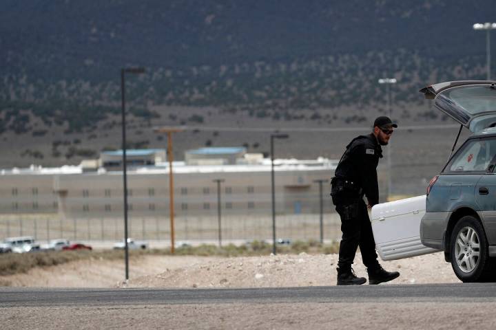 A corrections officer packs up a checkpoint near the entrance to Ely State Prison. (AP Photo/Jo ...