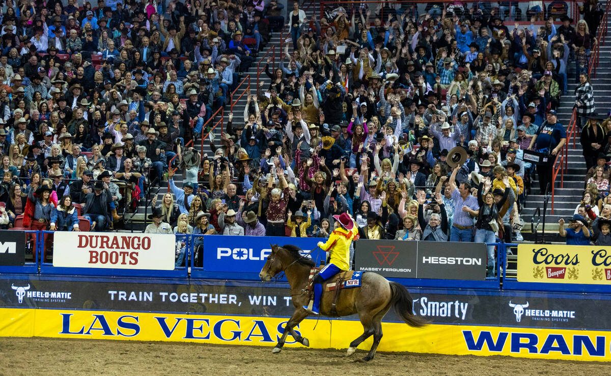 Rodeo Clown John Harrison as PRCA Clown of the Year gets the crowd to do the "wave" d ...