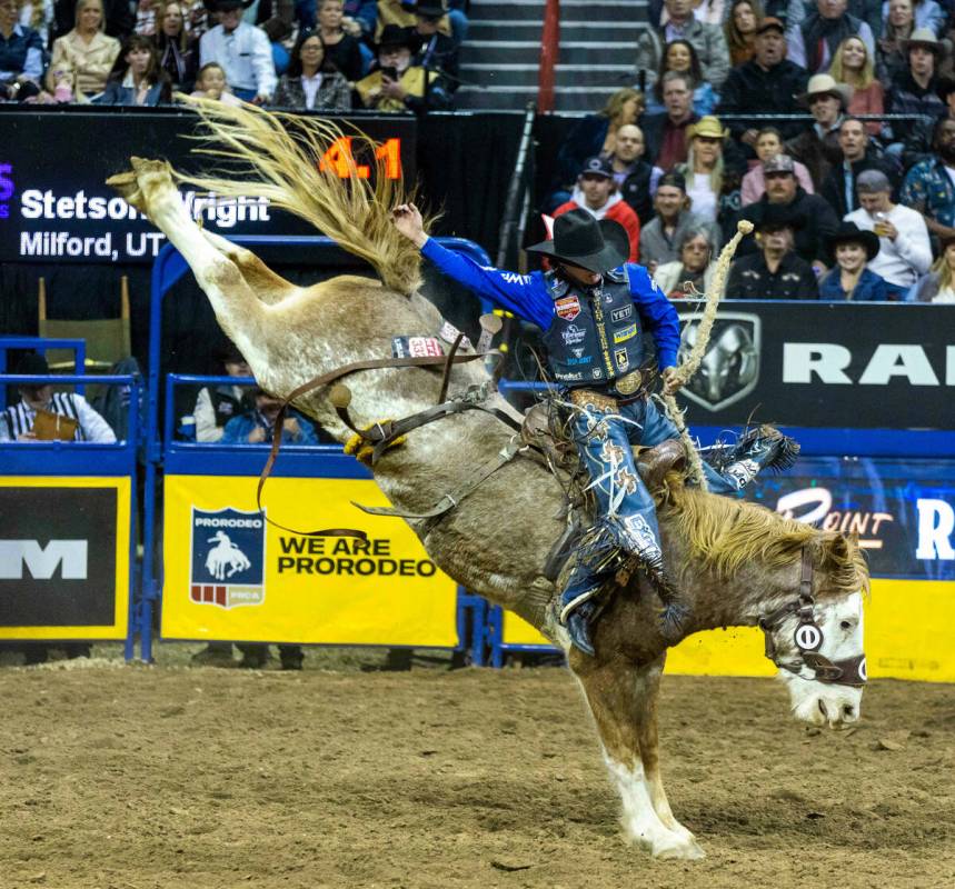 Stetson Wright of Milford, Utah, dominates on his ride in Saddle Bronc Riding during the Nation ...