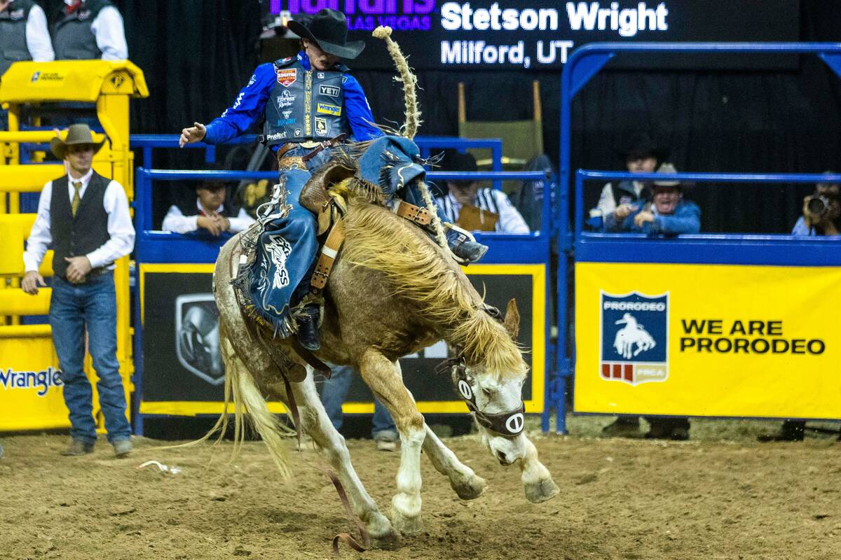 Stetson Wright of Milford, Utah, dominates on his ride in Saddle Bronc Riding during the Nation ...