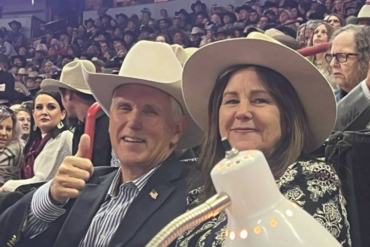 Former Vice President Mike Pence, with his wife Karen, are seen during the National Finals Rode ...