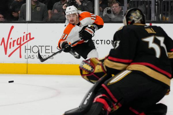 Philadelphia Flyers right wing Travis Konecny (11) attempts a shot on Vegas Golden Knights goal ...
