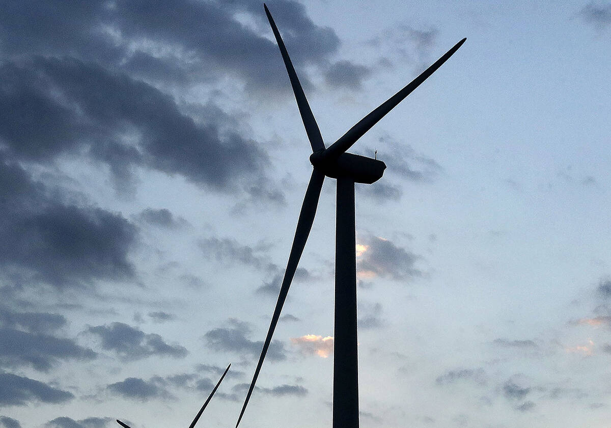 FILE - In this June 1, 2017 file photo, wind turbines, which are part of the Lost Creek Wind Fa ...