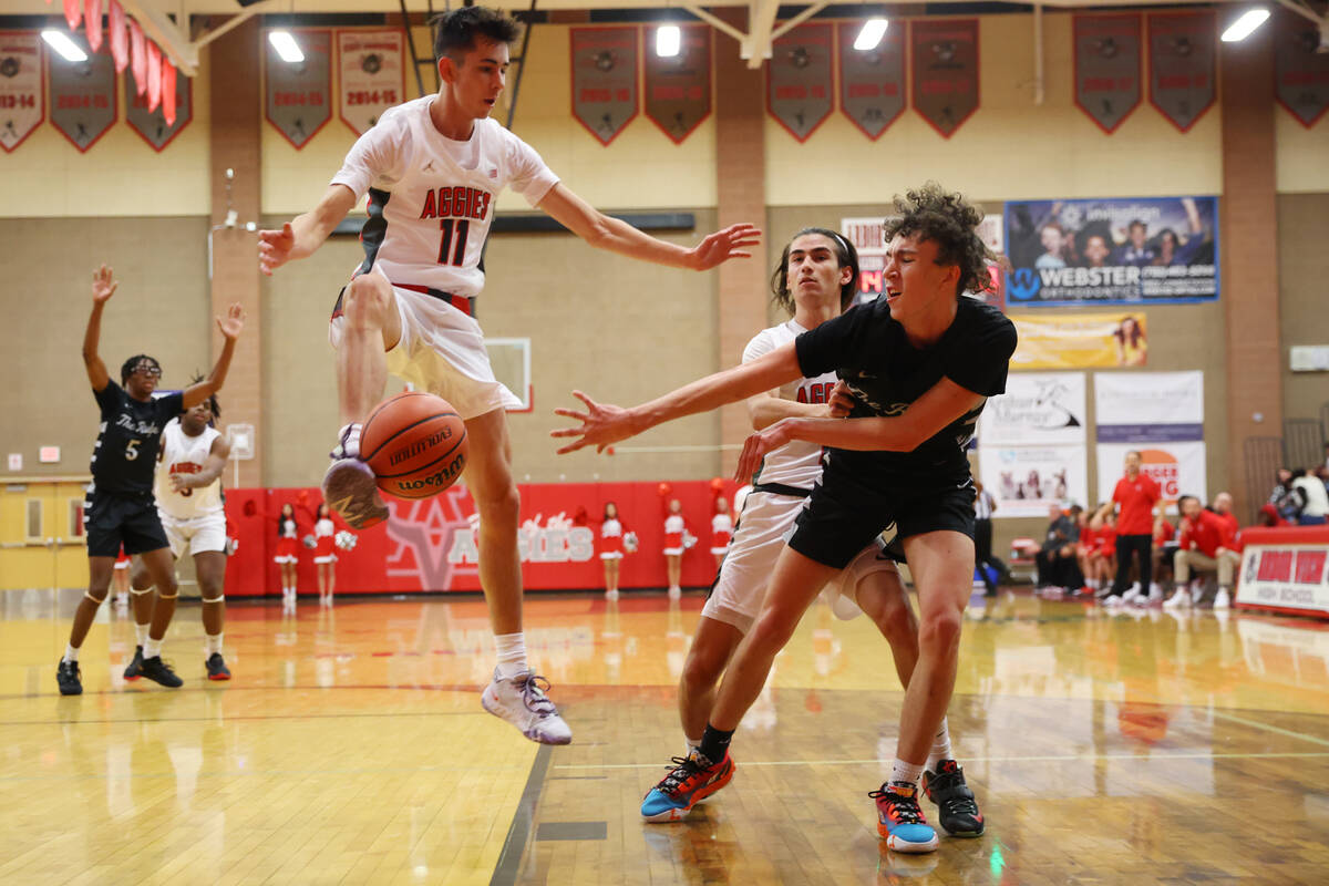 Arbor View's Rigde Adams (3) kicks the ball during a pass attempt by Shadow Ridge's Dylan Pulle ...