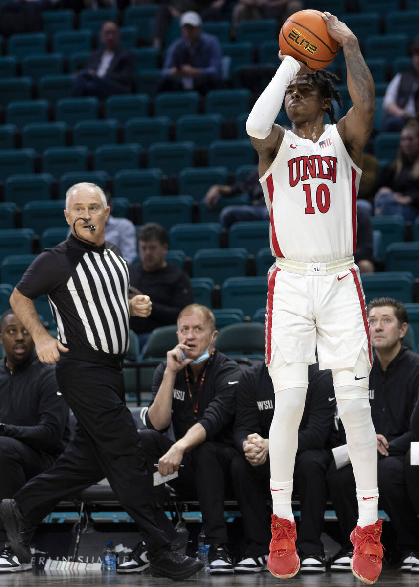 UNLV Rebels guard Keshon Gilbert (10) shoots a three-pointer during the first half of an NCAA c ...