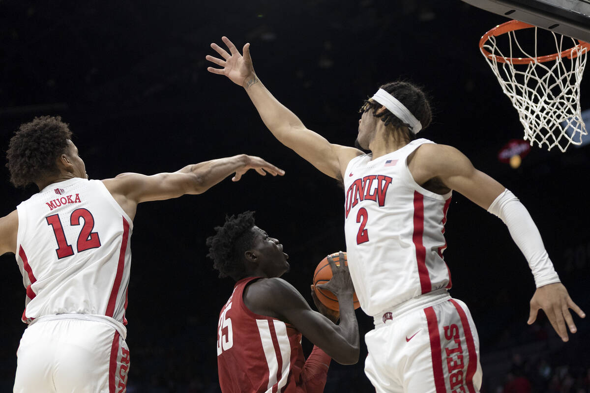 Washington State Cougars forward Mouhamed Gueye (35) shoots against UNLV Rebels center David Mu ...