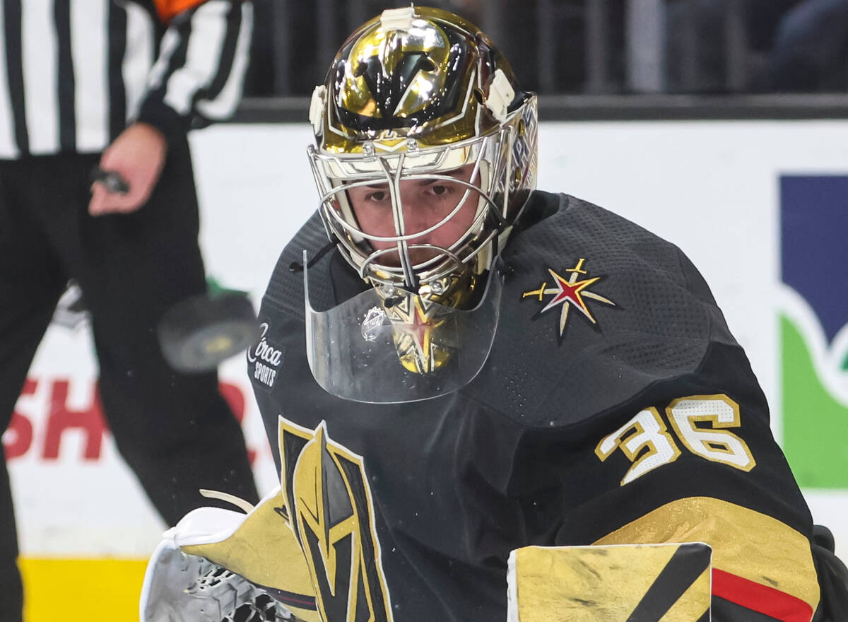 Golden Knights goaltender Logan Thompson (36) watches the puck rebound off a blocked shot from ...