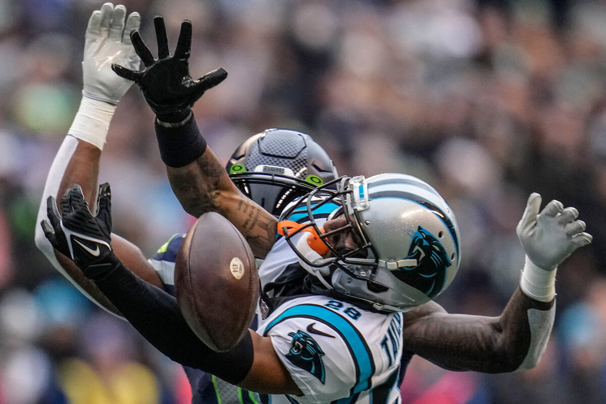 Seattle Seahawks wide receiver DK Metcalf (14) misses the ball against Carolina Panthers corner ...