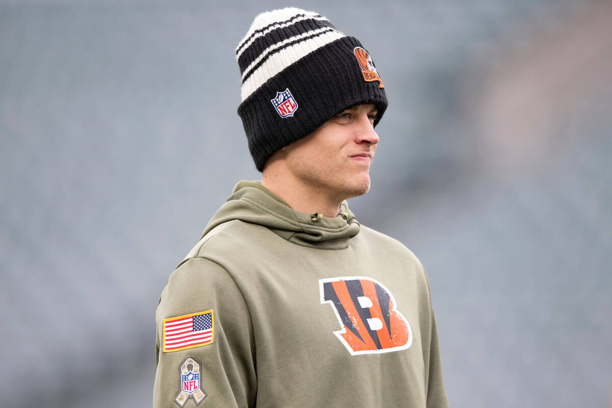 Cincinnati Bengals quarterback Joe Burrow (9) walks off the field after warming up before an NF ...