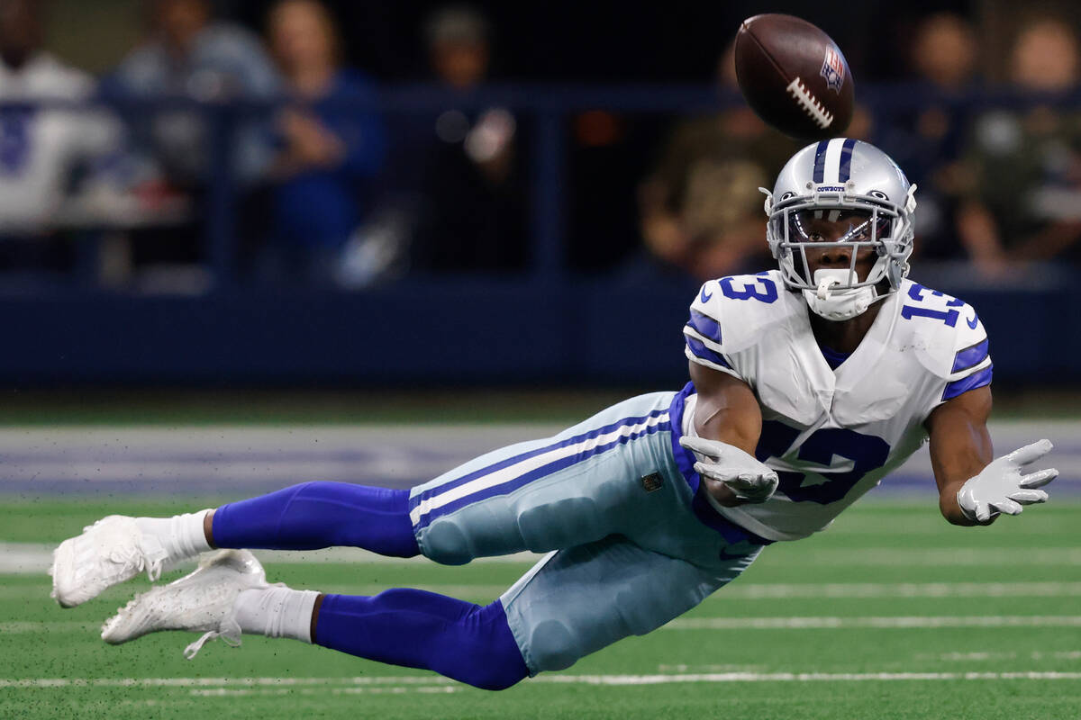 Dallas Cowboys wide receiver Michael Gallup (13) can't make a catch during the first half of an ...