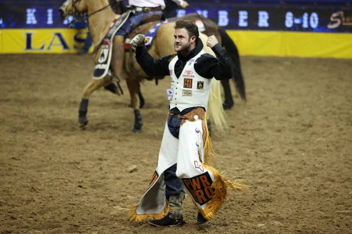 Kaycee Feild reacts after his run in the bareback riding event during round 10 of the 64th Wran ...