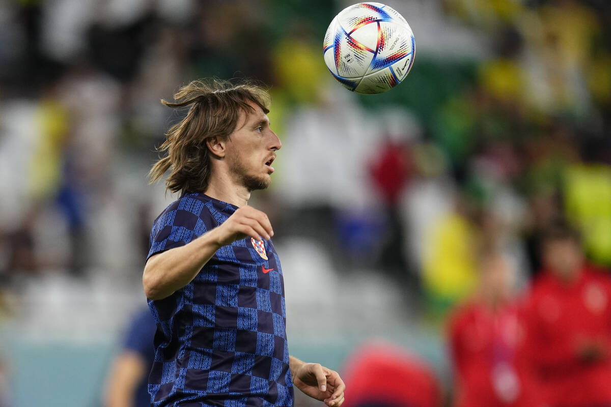 Croatia's Luka Modric warms up prior to the World Cup quarterfinal soccer match between Croatia ...