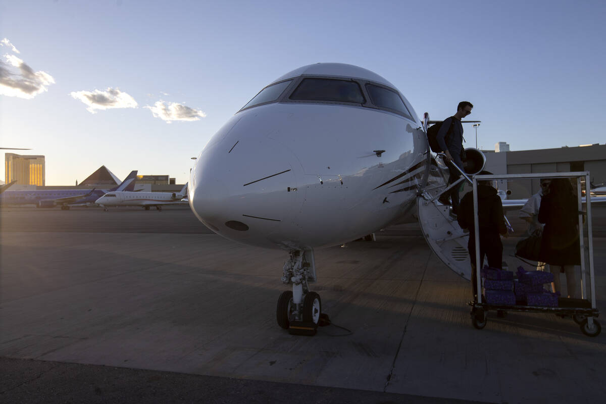 Passengers arrive from a Set Jet flight during a groundbreaking event for the company’s ...