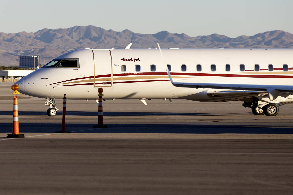 A Set Jet flight arrives before a groundbreaking event for the company’s new terminal at ...