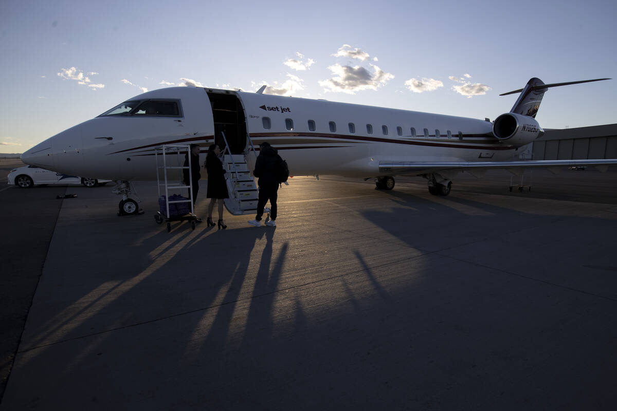 Passengers arrive from a Set Jet flight during a groundbreaking event for the company’s ...