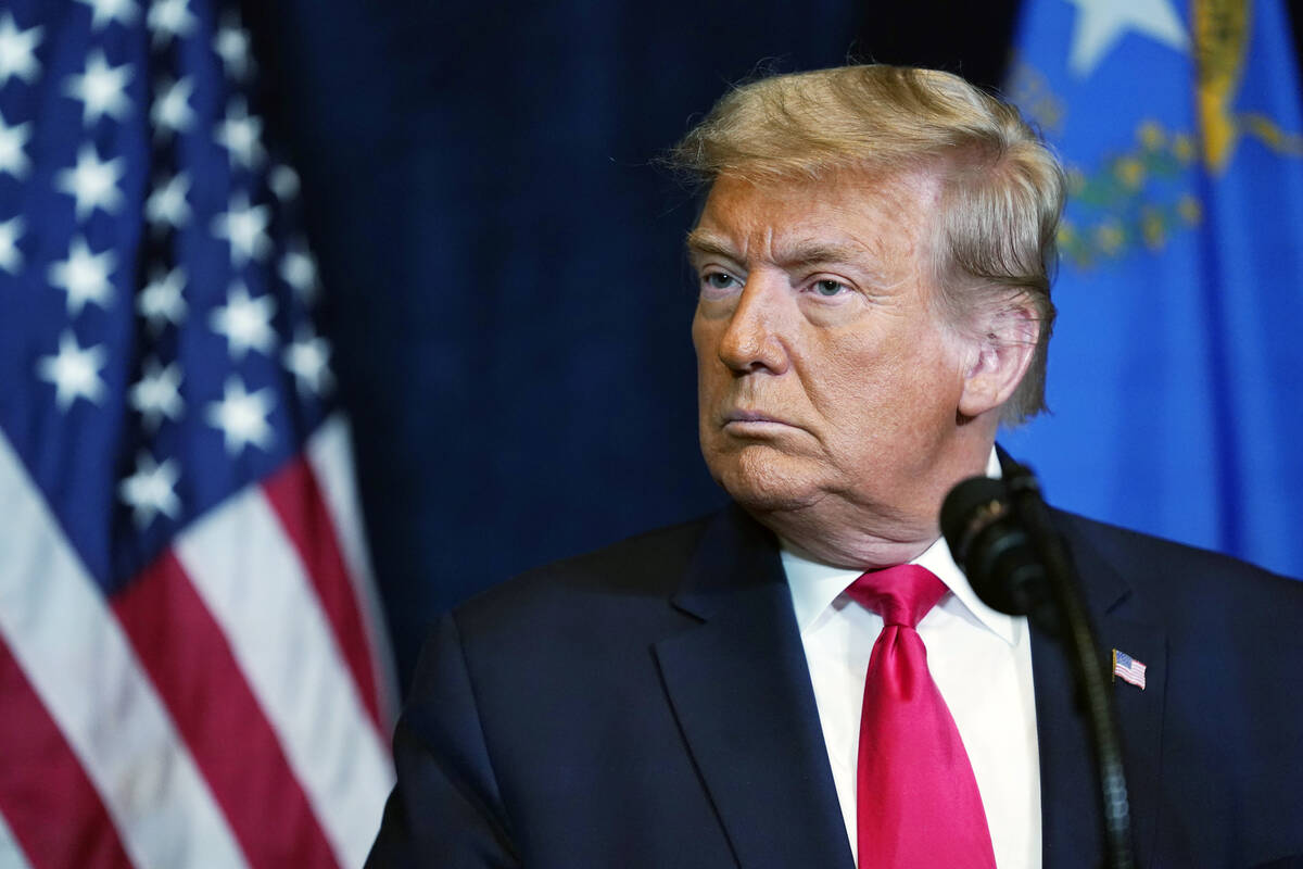 In this Wednesday, Oct. 28, 2020, file photo, President Donald Trump listens as Nevada business ...