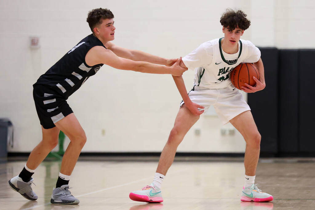 Shadow Ridge's Liam Guthrie (4) intentionally fouls Palo Verde's Mason Abittan (24) during a bo ...