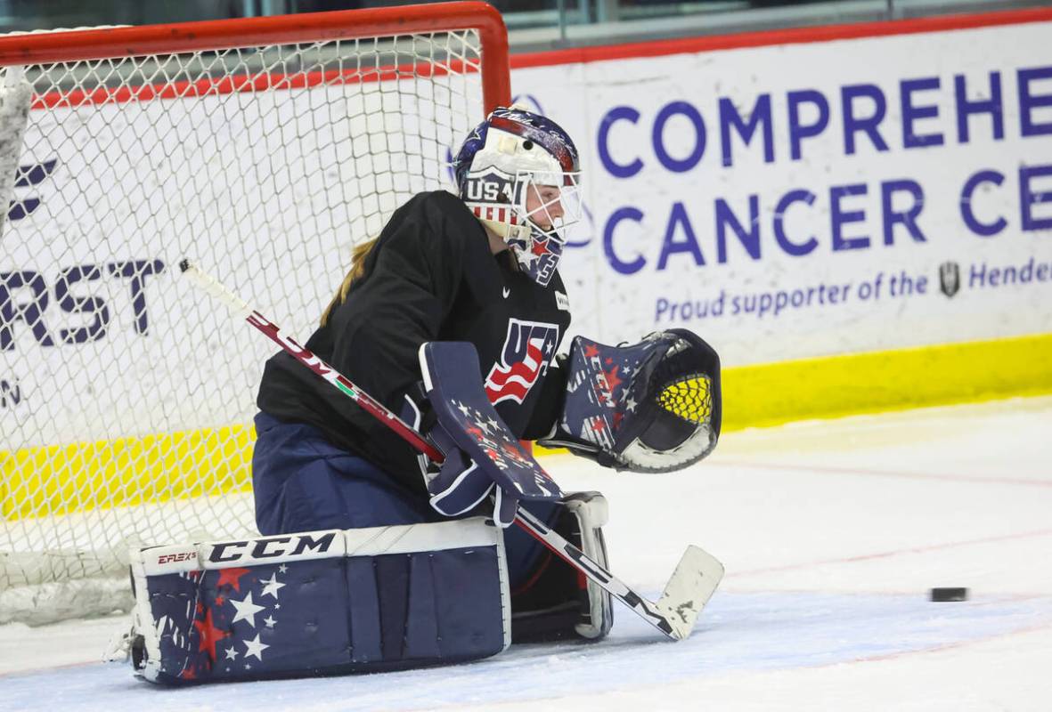 Goaltender Maddie Rooney of the U.S women's national hockey team defends the net during practic ...