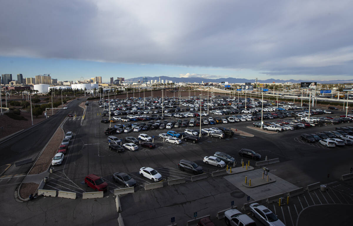 An airport staff parking lot is seen just north of the Terminal 1 parking garage at Harry Reid ...