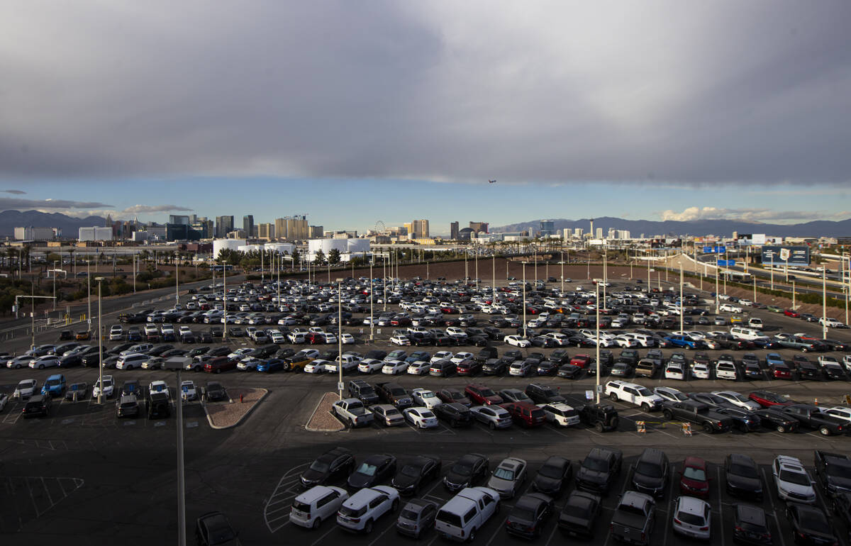 An airport staff parking lot is seen just north of the Terminal 1 parking garage at Harry Reid ...