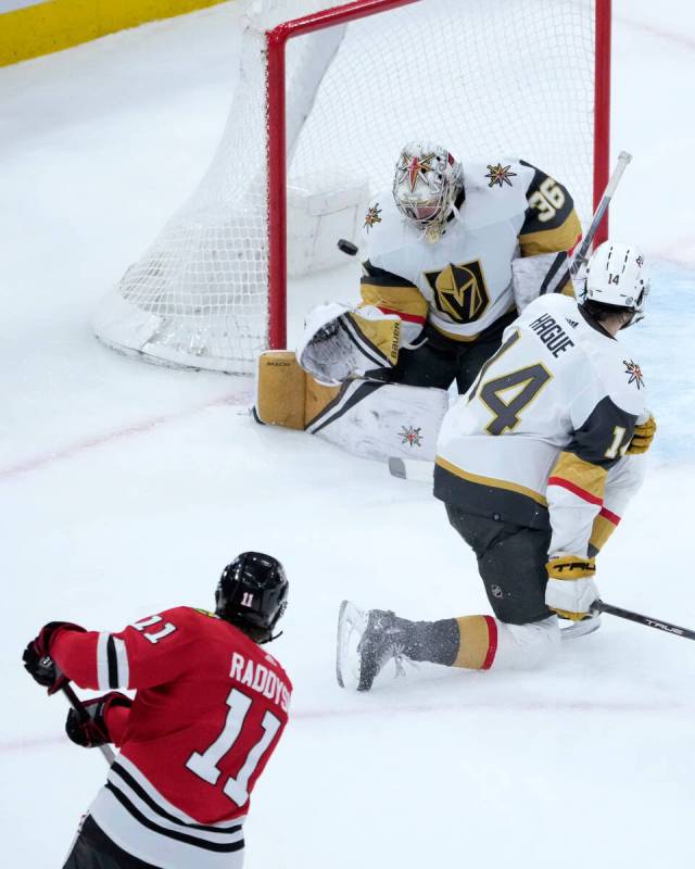 Chicago Blackhawks' Taylor Raddysh watches his shot score past Vegas Golden Knights goaltender ...