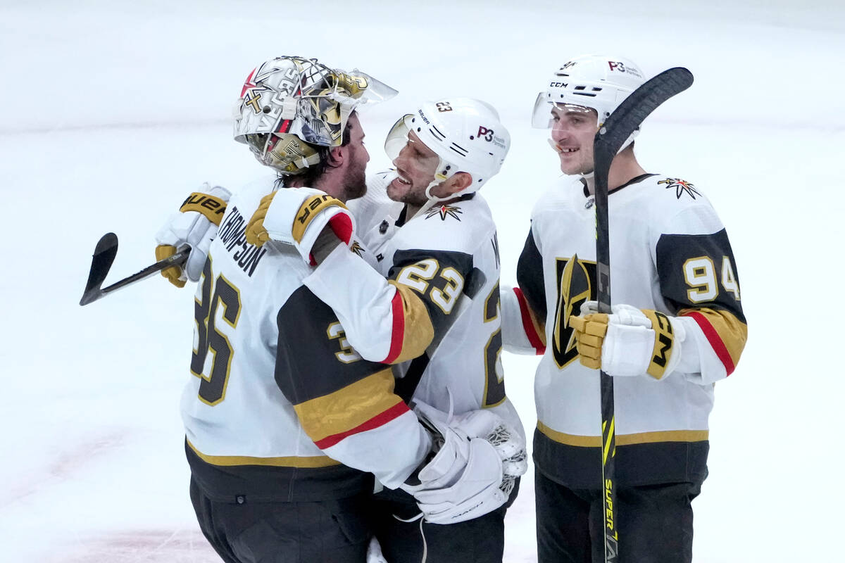 Vegas Golden Knights goaltender Logan Thompson (36) Alec Martinez, and Brayden Pachal celebrate ...