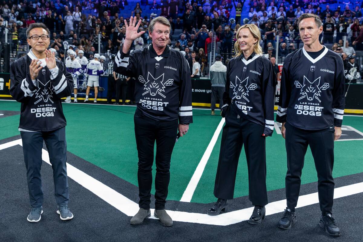 Desert Dogs team owners Joe Tsai, Wayne Gretzky, Janet Jones and Steve Nash greet the crowd as ...