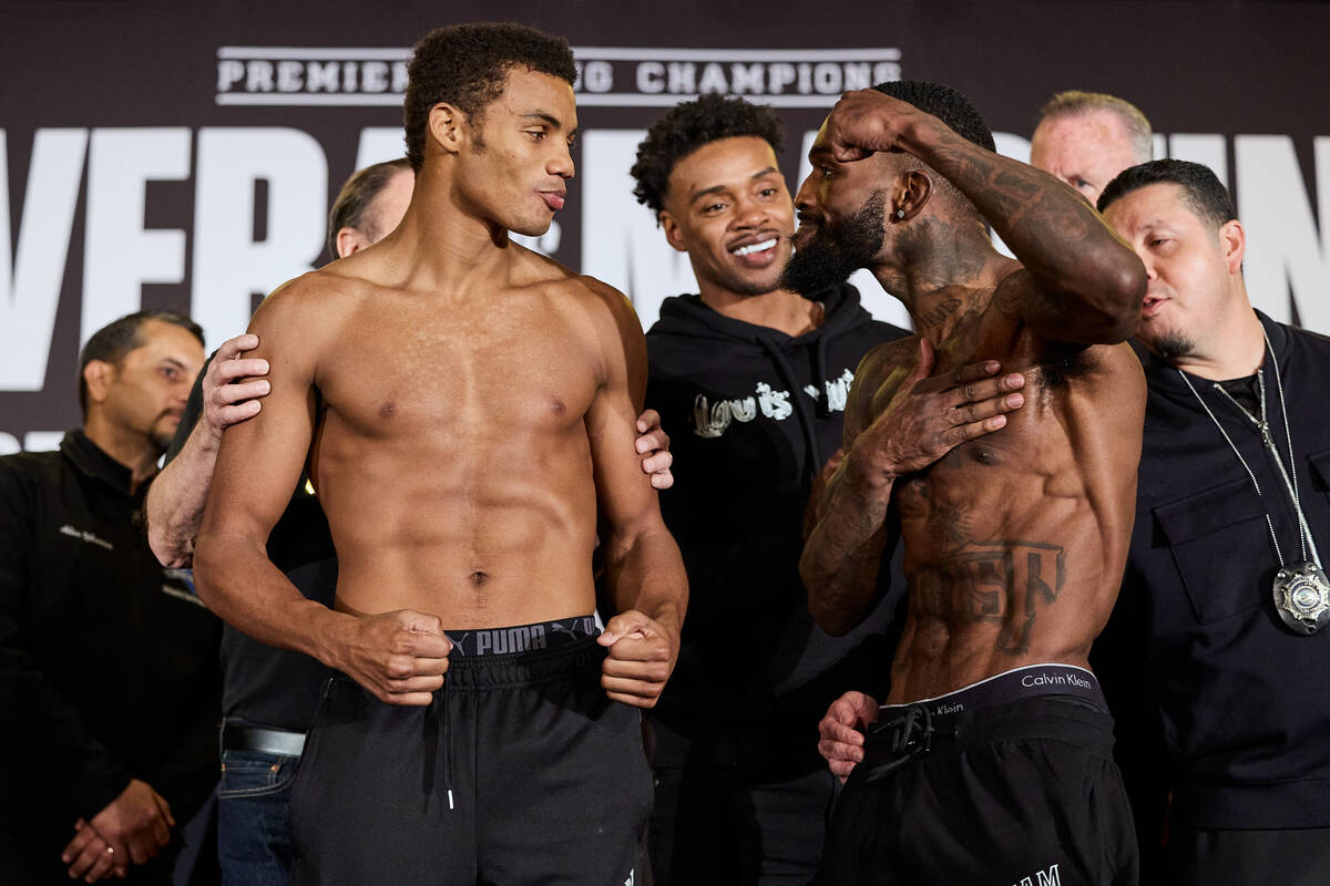 Unbeaten lightweights Michel Rivera, left, and Frank Martin conclude a staredown as unified wel ...