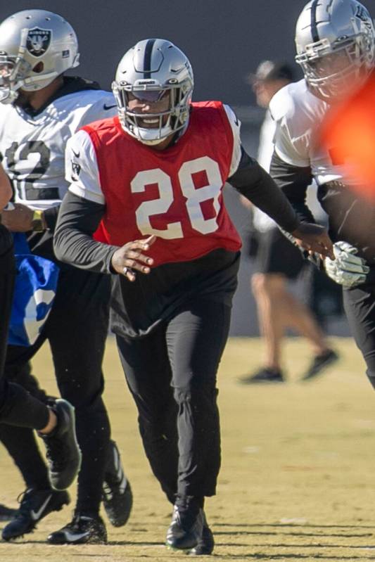 Raiders running back Josh Jacobs (28) runs to drills during practice at the Intermountain Healt ...