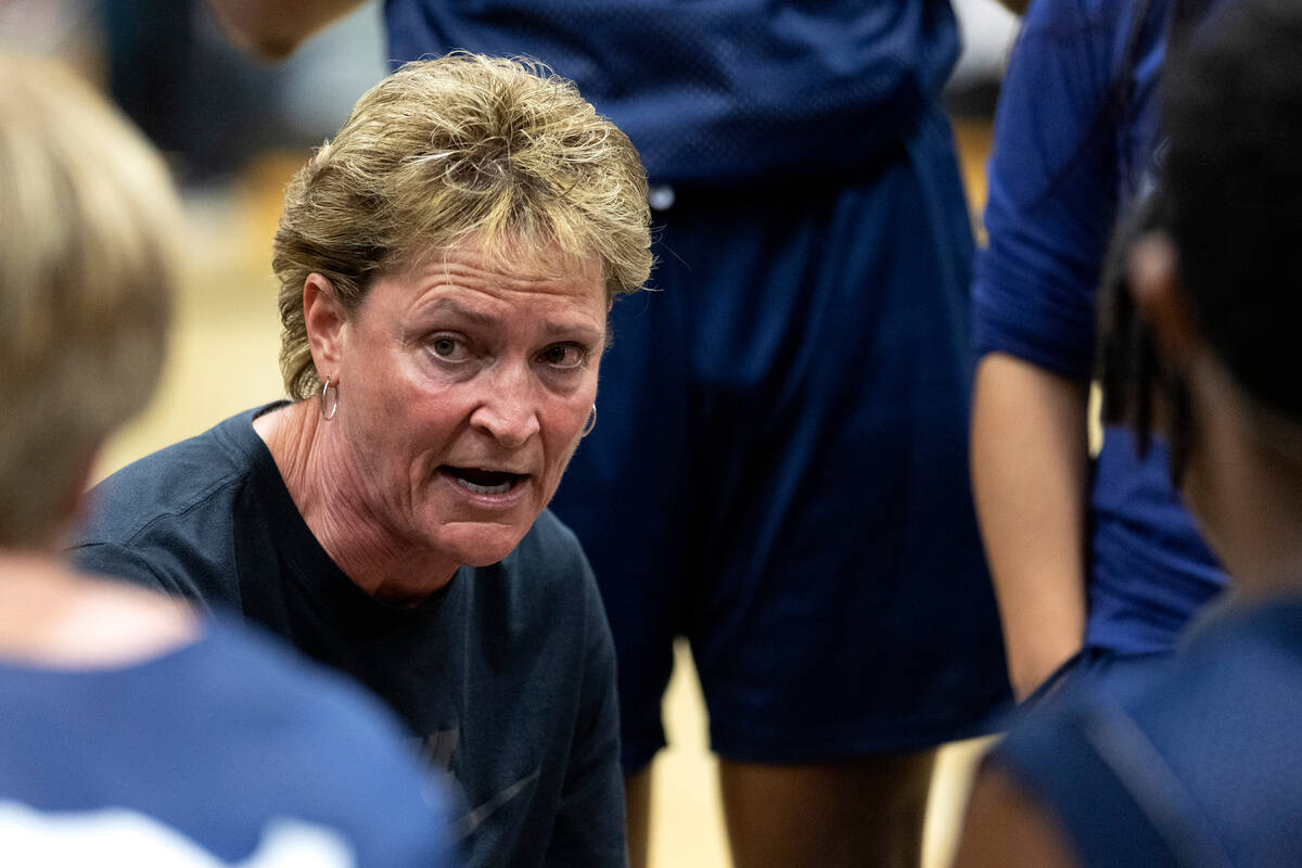 Centennial head coach Karen Weitz, who coaches the school’s boys and girls basketball te ...