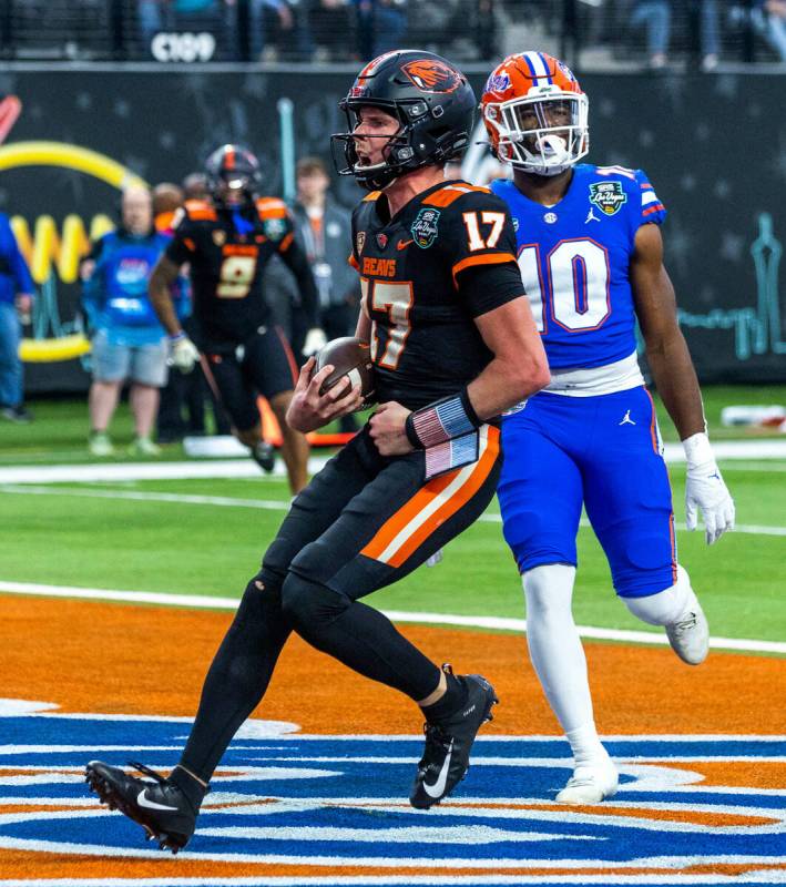 Oregon State Beavers quarterback Ben Gulbranson (17) yells out as he scores past Florida Gators ...