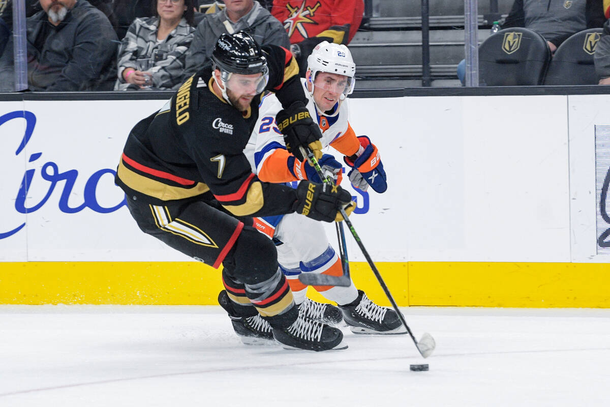 Vegas Golden Knights defenseman Alex Pietrangelo (7) and New York Islanders center Brock Nelson ...