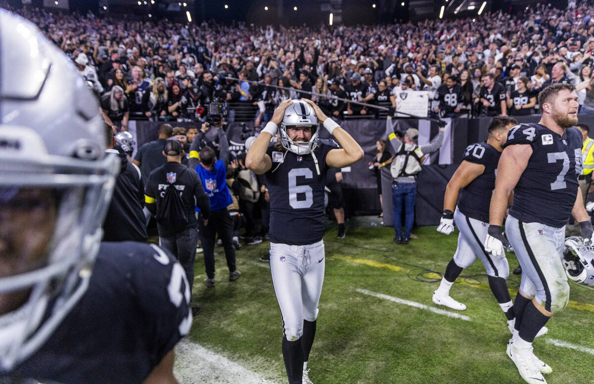 Raiders punter AJ Cole (6) and teammates celebrate their win over the New England Patriots foll ...