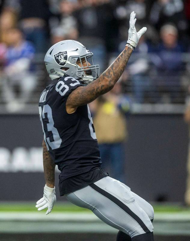 Raiders tight end Darren Waller (83) celebrates a touchdown catch versus the New England Patrio ...