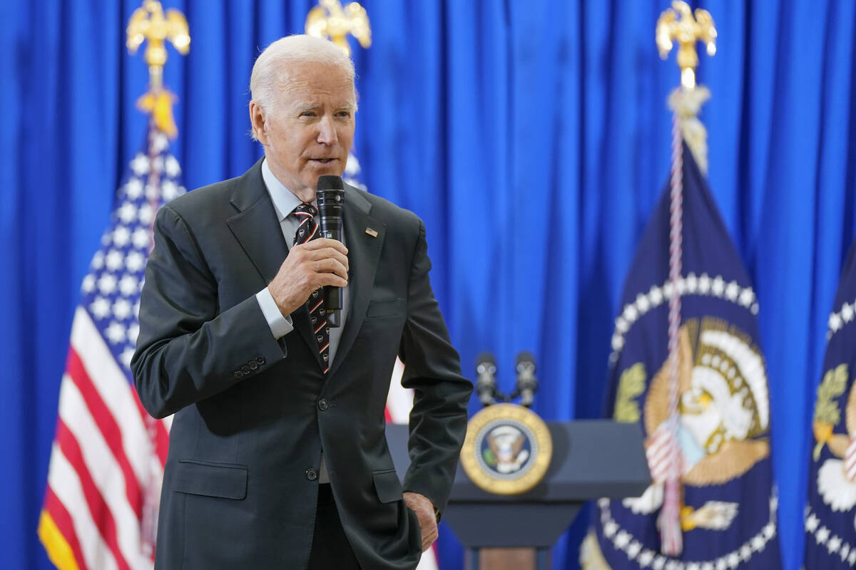 President Joe Biden speaks in New Castle, Del., on Friday, Dec. 16, 2022. (AP Photo/Manuel Balc ...