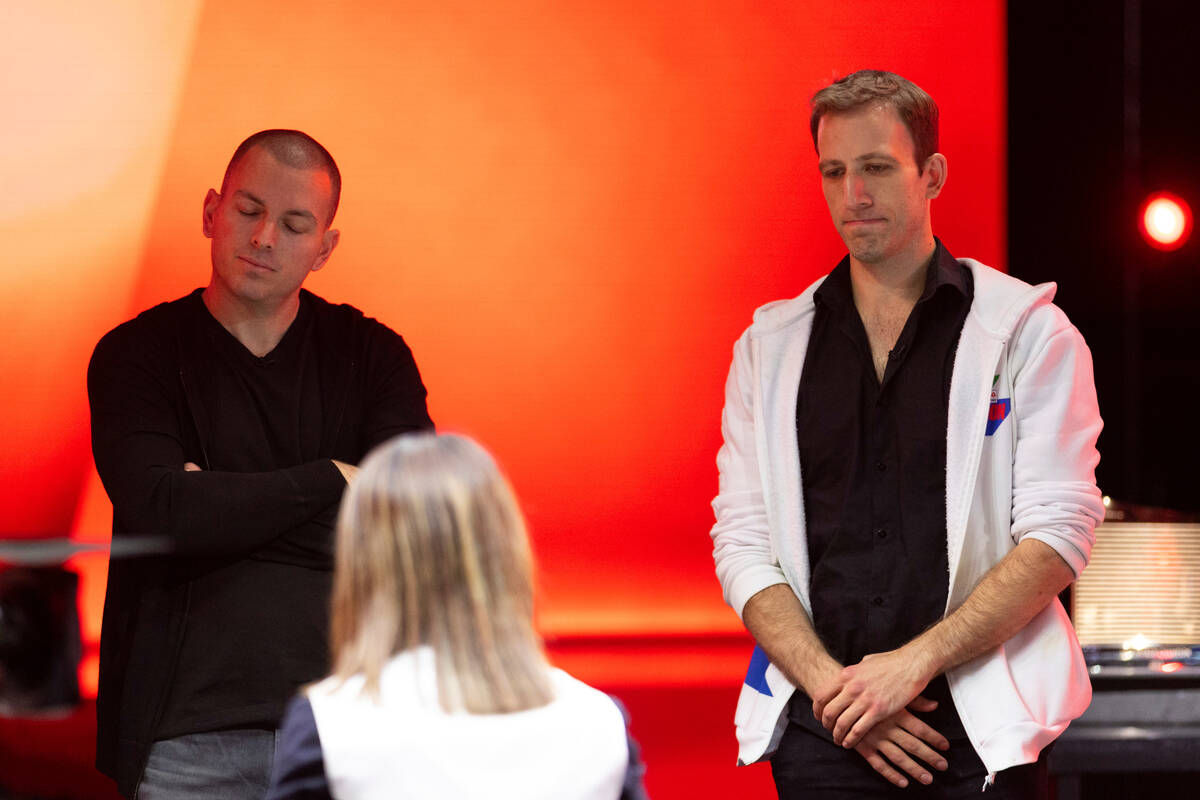 Adam Adler, left, and Benny Glaser, react as cards are shown in the final table of the World Po ...