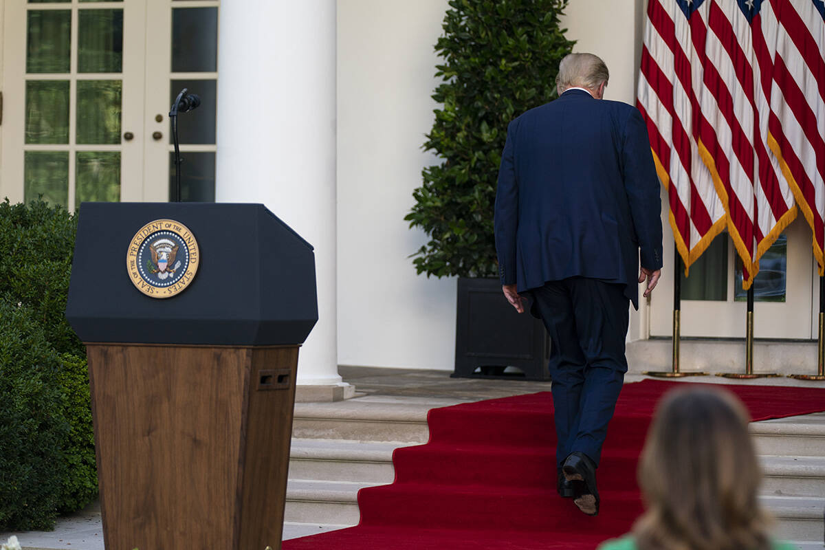 FILE - President Donald Trump walks off after speaking during a news conference in the Rose Gar ...